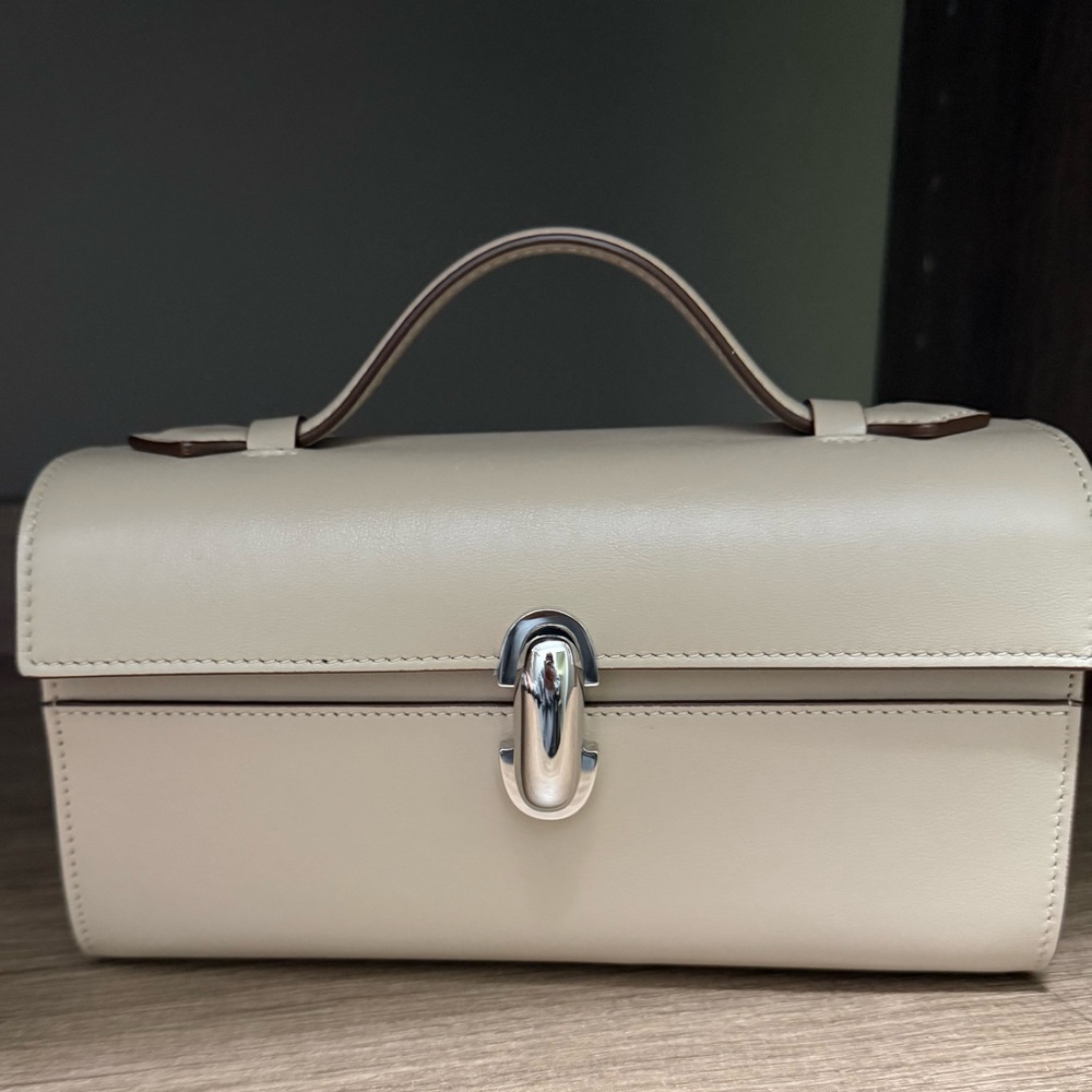 Savette Symmetry top handle clutch in bone